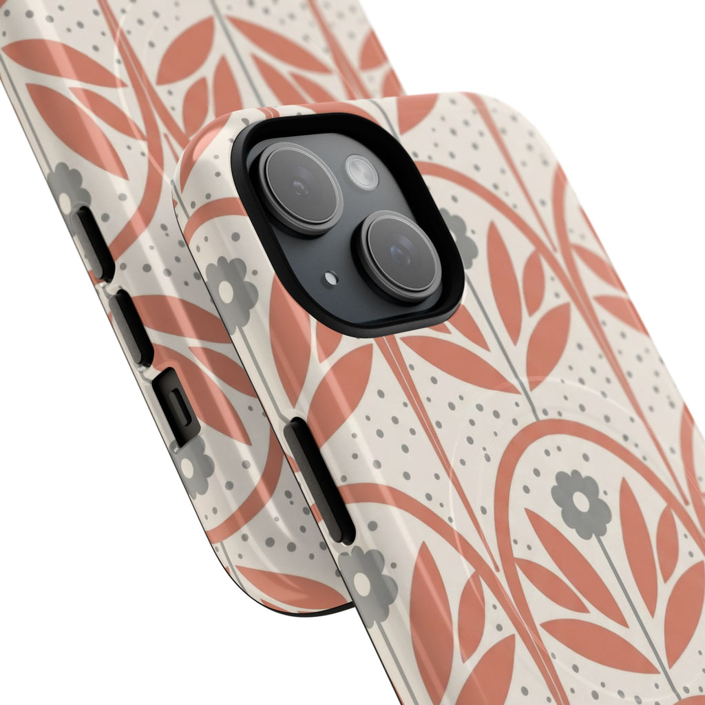Muted terracotta floral blooms in repeating arch pattern on creamy speckled background with vintage cottage aesthetic on MagSafe-compatible phone case