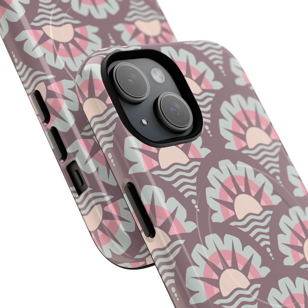 Vintage floral sunset pattern with stylized sun and wave motifs in muted mauve, soft pink, and mint green accents on MagSafe-compatible dual-layer iPhone case