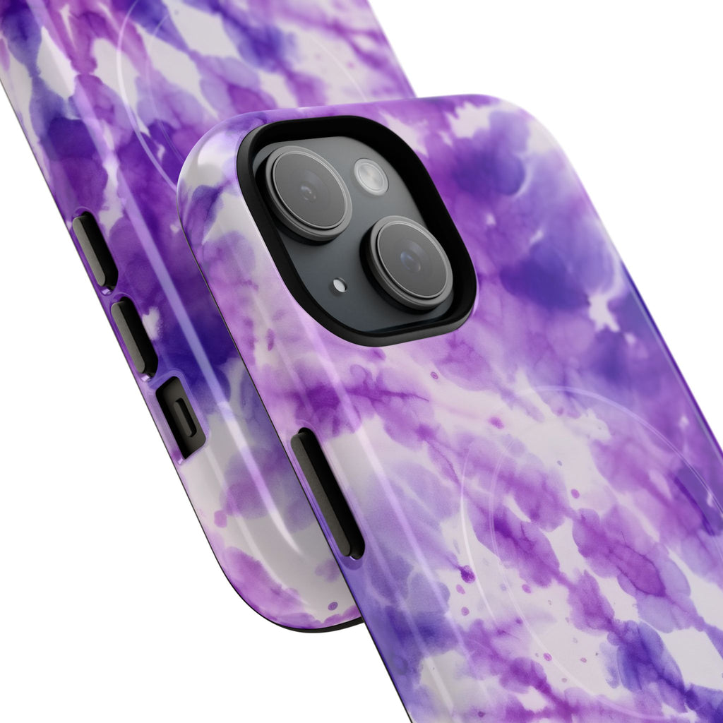 Purple tie-dye watercolor iPhone case with MagSafe compatibility featuring dual-layer protective construction, flowing artistic pattern in vibrant purple tones with glossy or matte finish for wireless charging