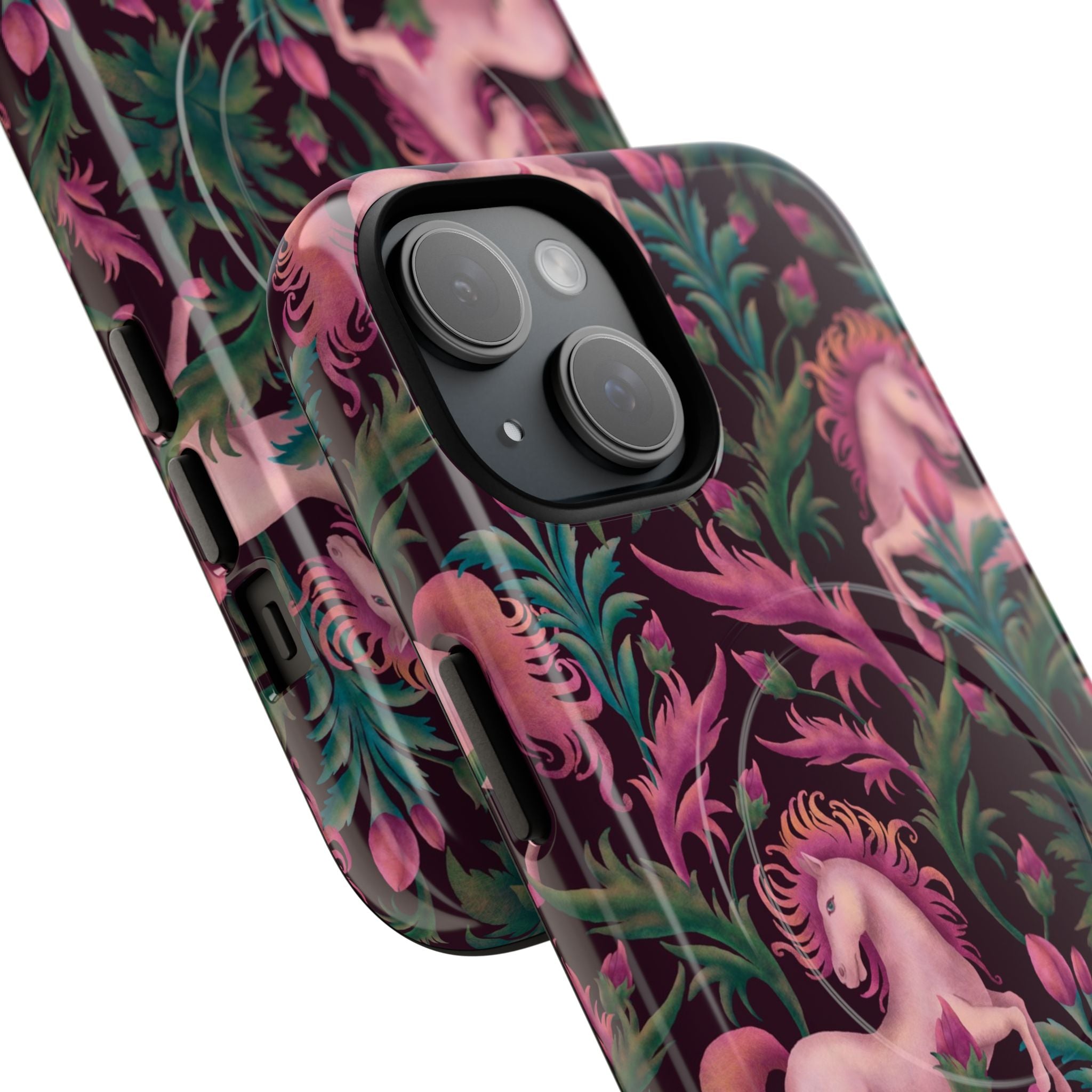Graceful pink unicorns dancing among lush curling foliage and botanical elements against rich jewel-toned background in whimsical vintage fantasy art style on dual-layer MagSafe-compatible protective phone case with polycarbonate shell